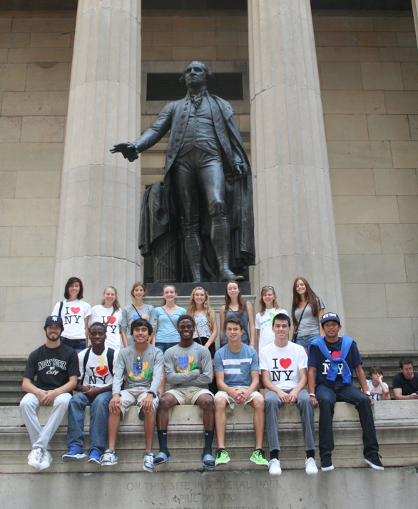The Aloha cross country team at the Federal Building across the street from the New York Stock Exchange.